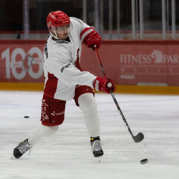 Forward attacking the slot with the puck on their stick